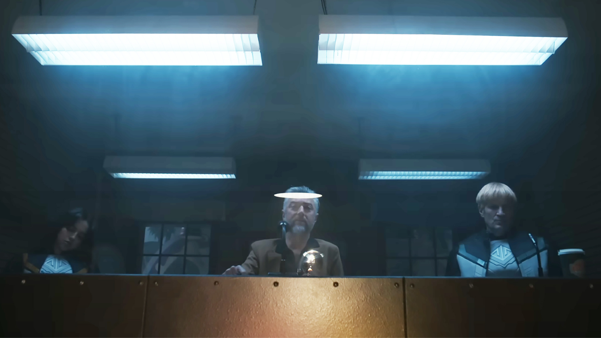 Isabela Merced as Hawkgirl, Sean Gunn as Maxwell Lord, and Nathan Fillion as Guy Gardner in Peacemaker season 2.