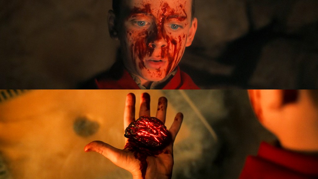 Henry Creel with the rock from the briefcase in Stranger Things series finale
