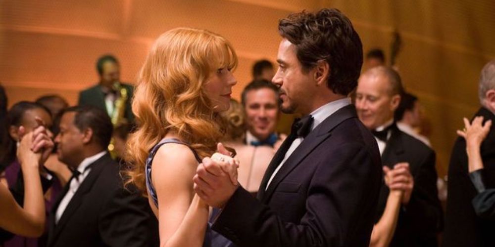 Iron Man and Pepper Potts dancing in Iron Man movie