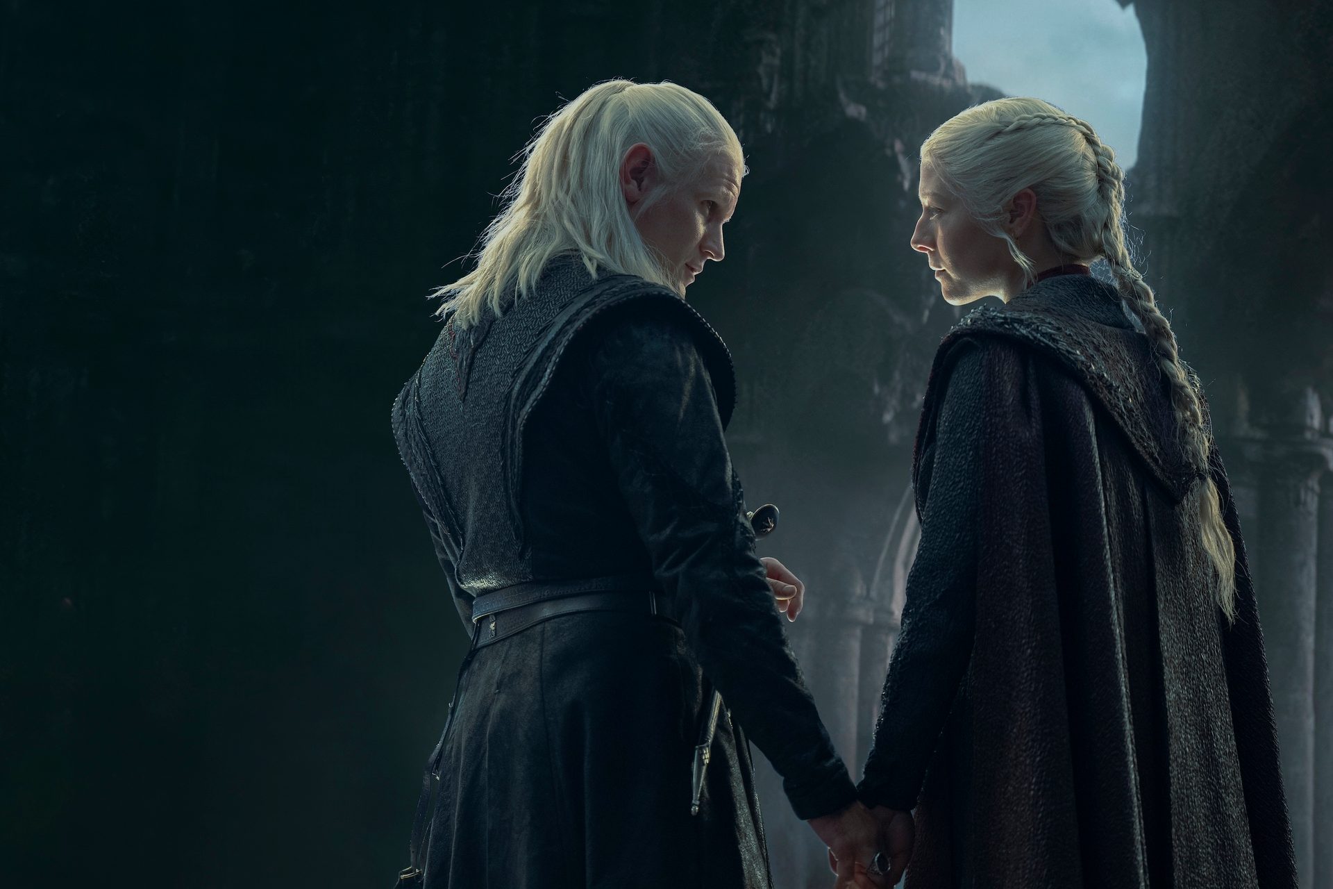 Matt Smith as Daemon Targaryen and Emma D'Arcy as Rhaenyra Targaryen in House of the Dragon season 2 holding hands