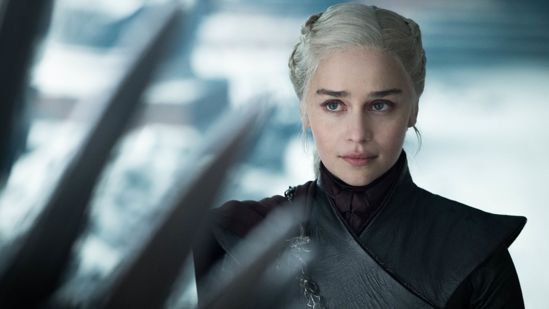 Emilia Clarke as Daenerys looking at the Iron Throne in Game of Thrones