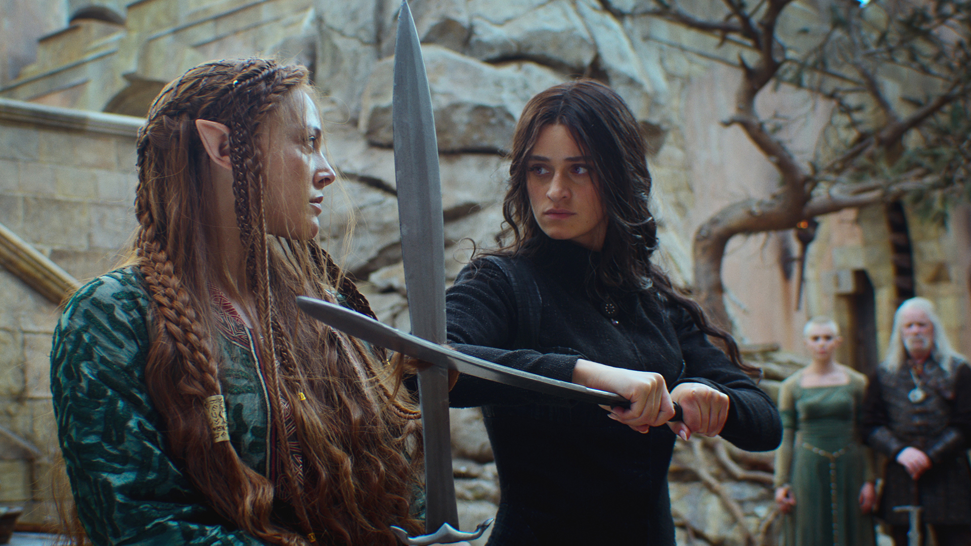 Francesca and Yennefer looking at each other with their swords locked together in The Witcher season 4