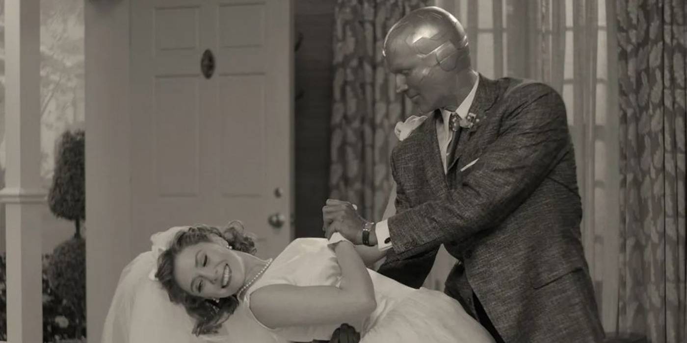 Vision (Paul Bettany) dips Wanda (Elizabeth Olsen) in the black and white WandaVision pilot episode