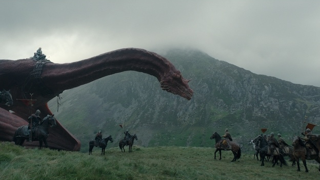 Caraxes (ridden by Daemon) stands over mounted troops in House of the Dragon season episode