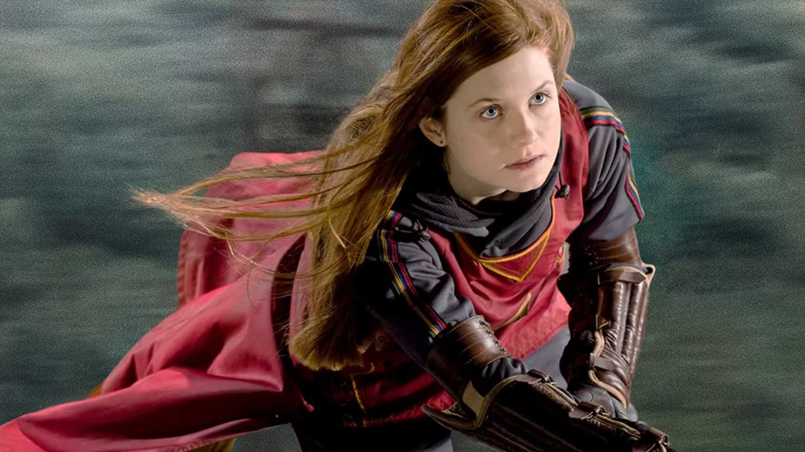 Ginny flies her broom in Quidditch.