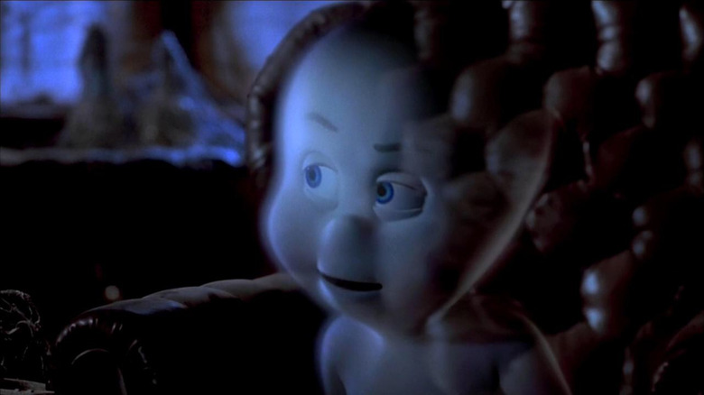 Casper the friendly ghost sitting in a leather chair in the movie Casper